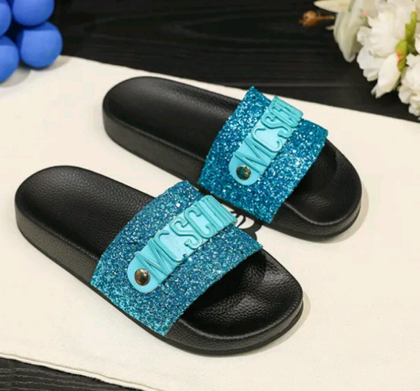 Ocean Blue Moschino Couture!
Logo Glitter Slides