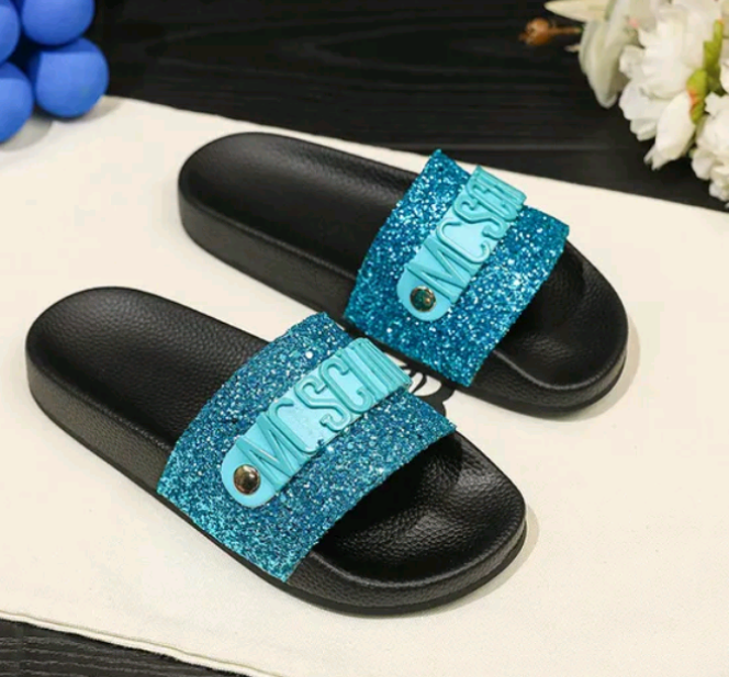 Ocean Blue Moschino Couture!
Logo Glitter Slides
